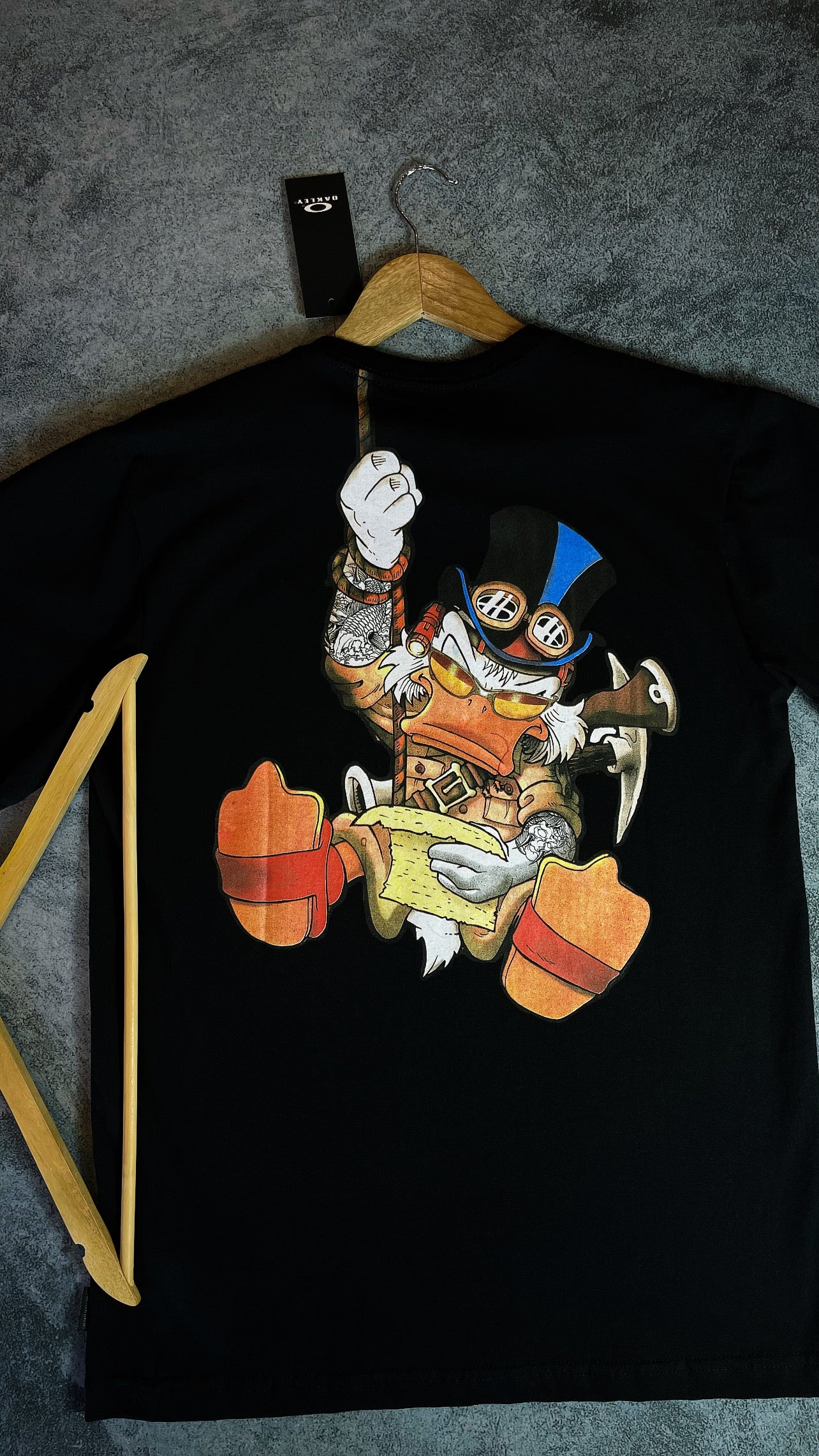 Camisa Oakley edição tio patinhas